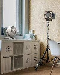 White 5303DC small air circulator on a white storage cabinet by a window