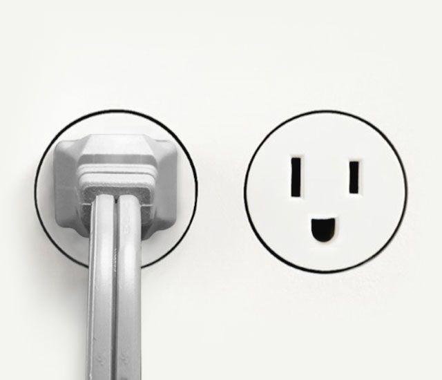 Z Series DC Energy white plug in an outlet