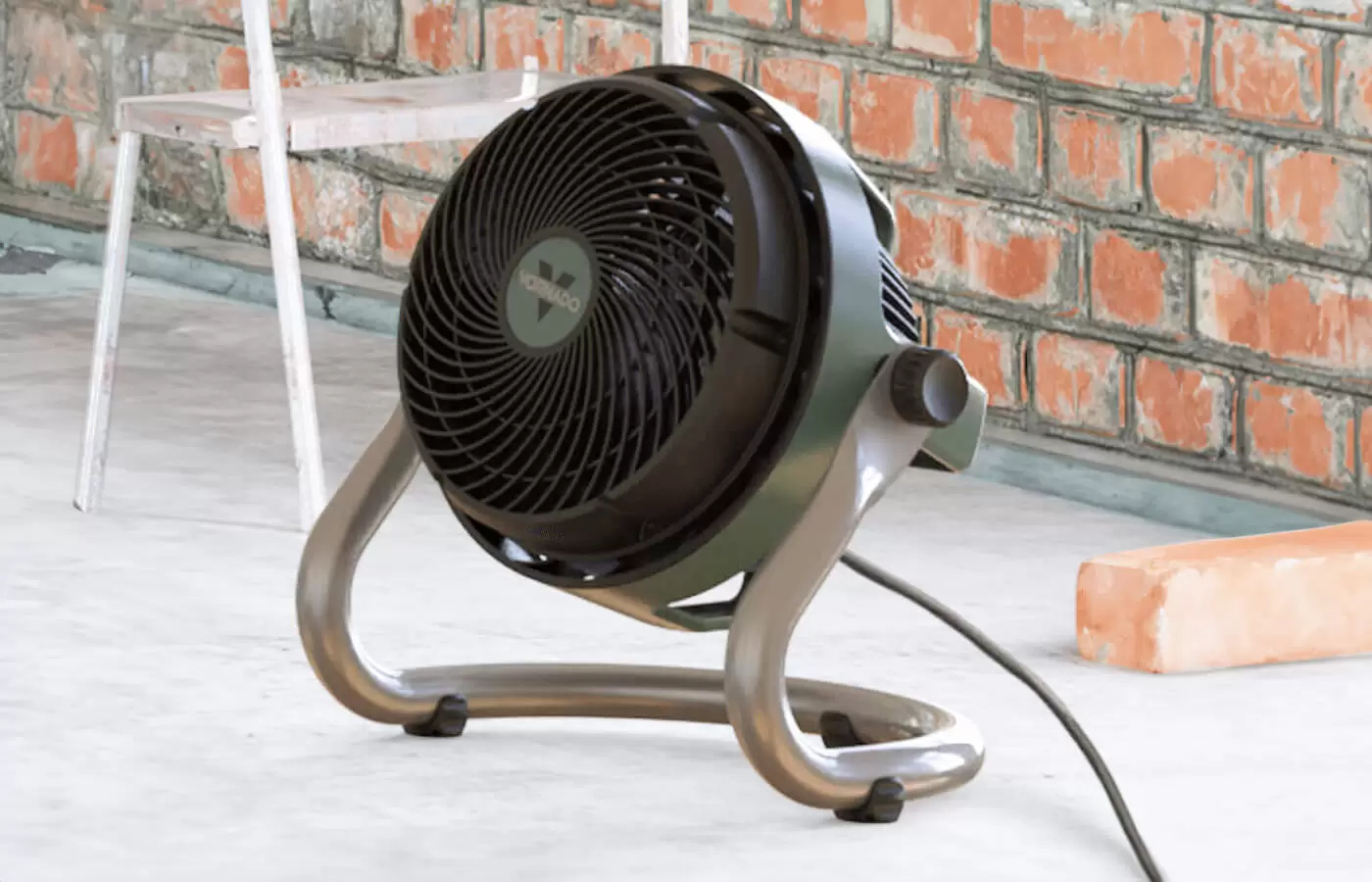 EXO61 HD Stable Steel Base EXO61 HD on a concrete floor with a brick wall.