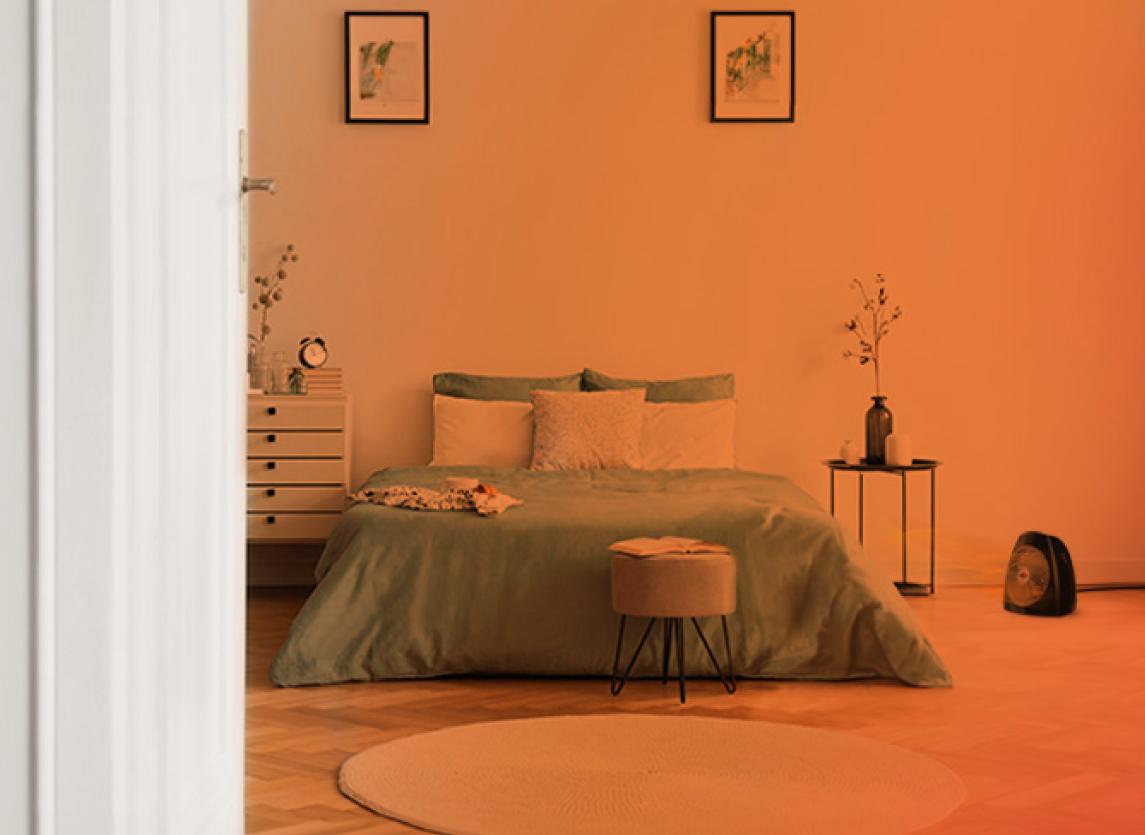 Whole Room Heat Circulation Bedroom through an open door with an orange gradient to show whole Room heat circulation