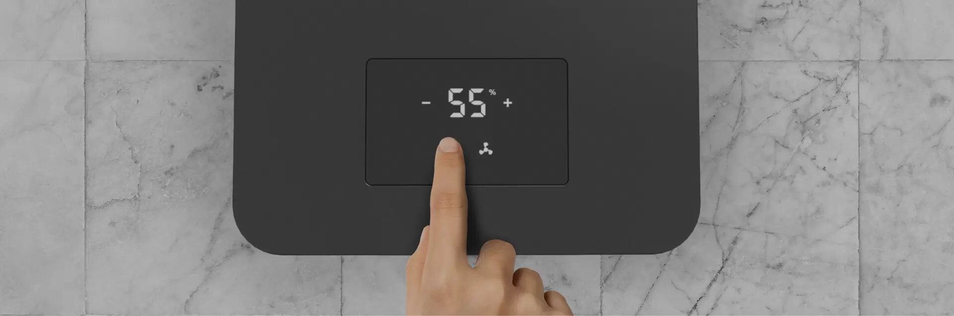 EV3 Set and Forget A finger hovering over EV3's control panel