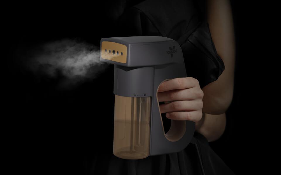 Express Warranty Woman holding the Express handheld garment steamer. The shot is almost completely dark and steam is coming out of Express.