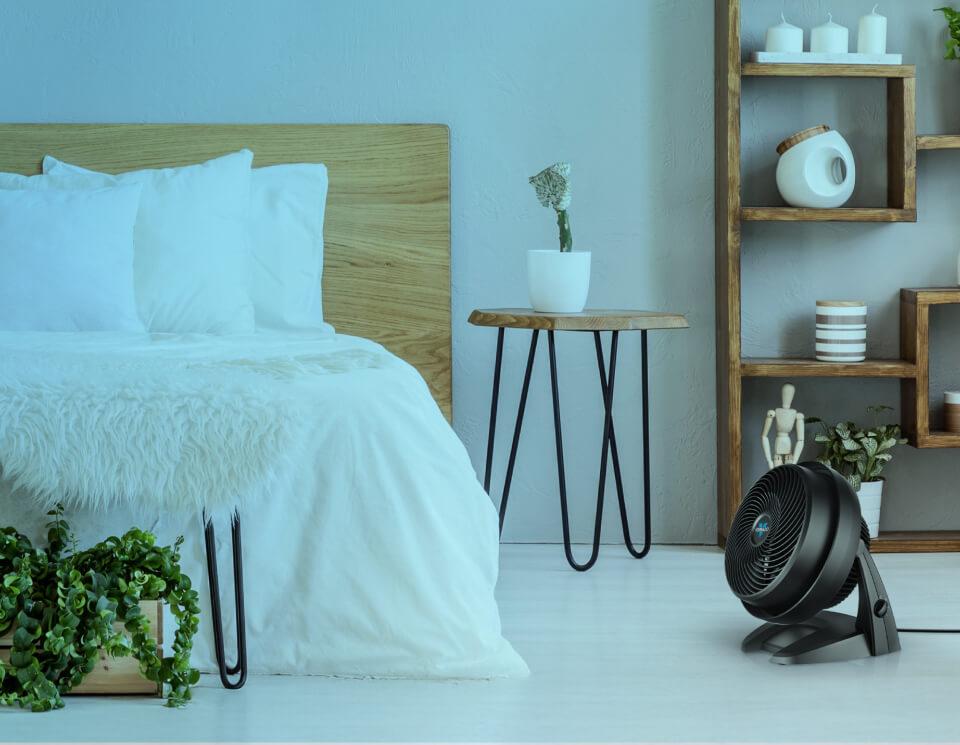 630 air circulator on the floor of a bedroom.