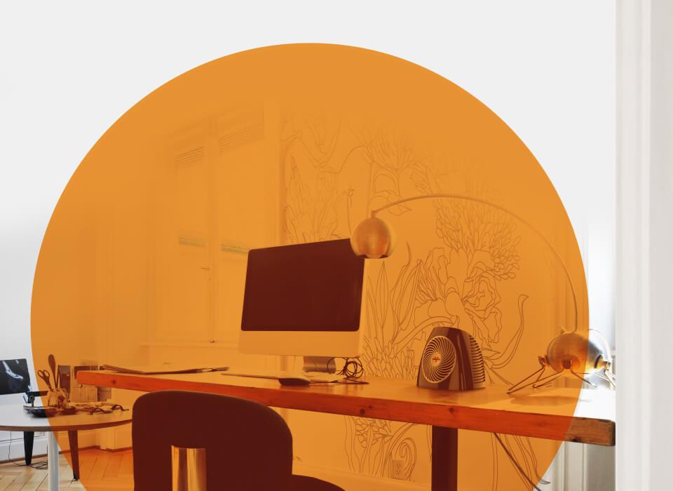 VH202+ on a head by a computer monitor. A transparent orange circle shows the heaters spot heat.