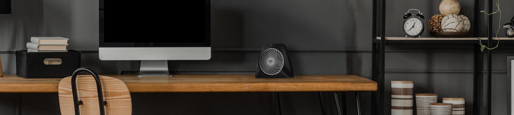 VH204 on a personal work desk near a monitor